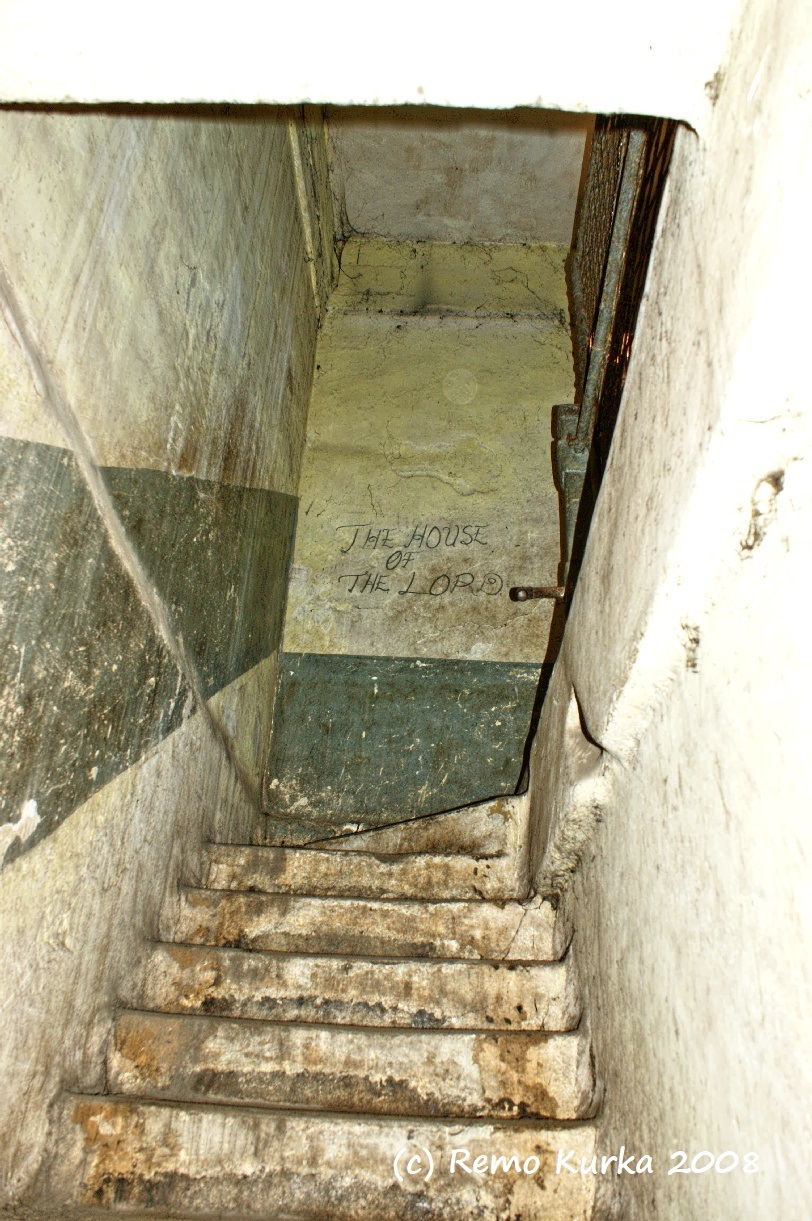 Remo Kurka Walking up to the cell area, Kwame Nkrumah was held 1950-1951, and photograping the sairs up at Ussher Fort Prison 2008